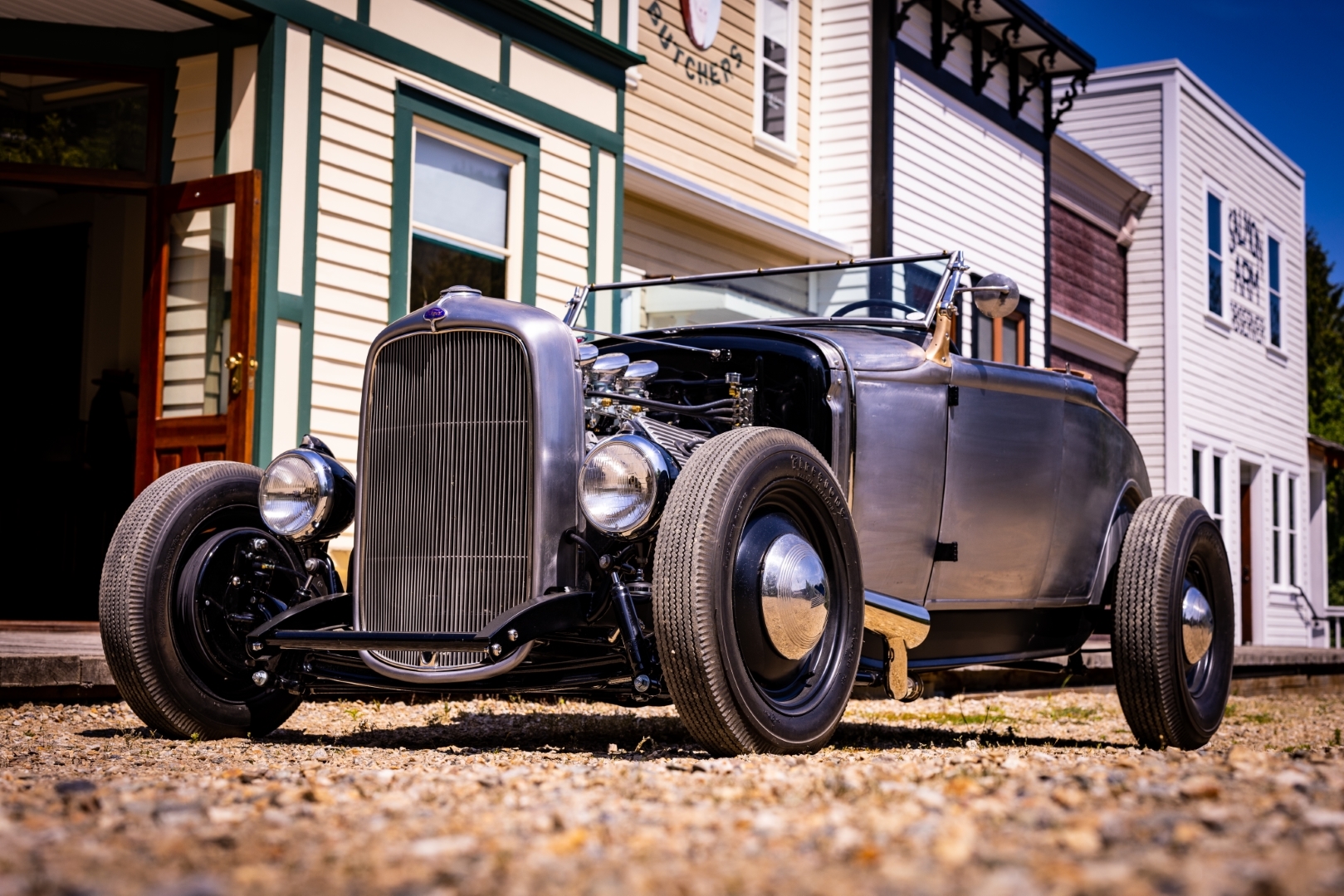 A vintage car at the heritage village