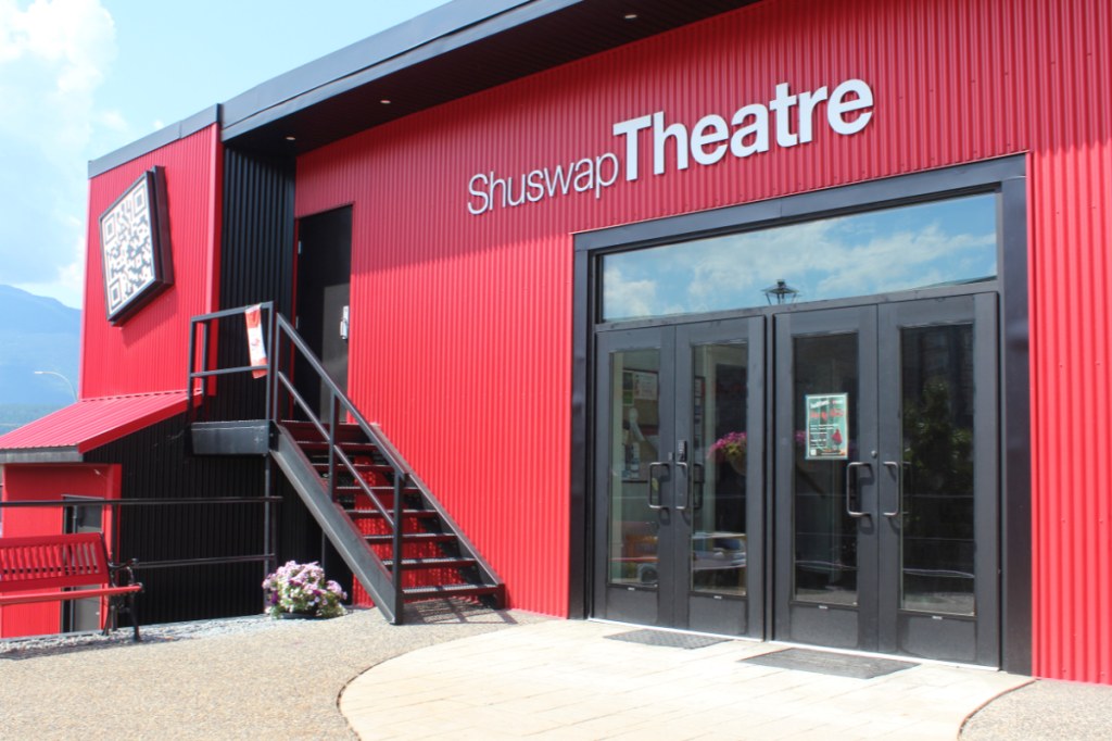 The red exterior and glass entrance of the Shuswap Theatre